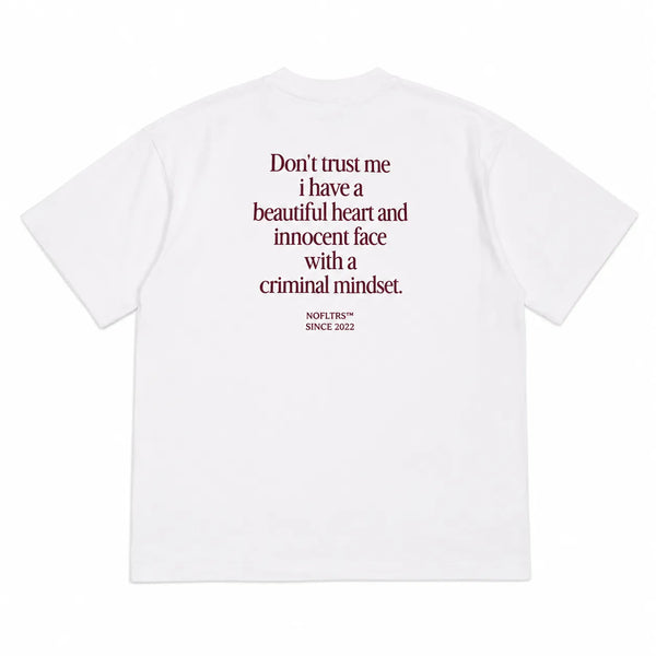 DON'T TRUST ME I HAVE A BEAUTIFUL HEART AND INNOCENT FACE WITH A CRIMINAL MINDSET