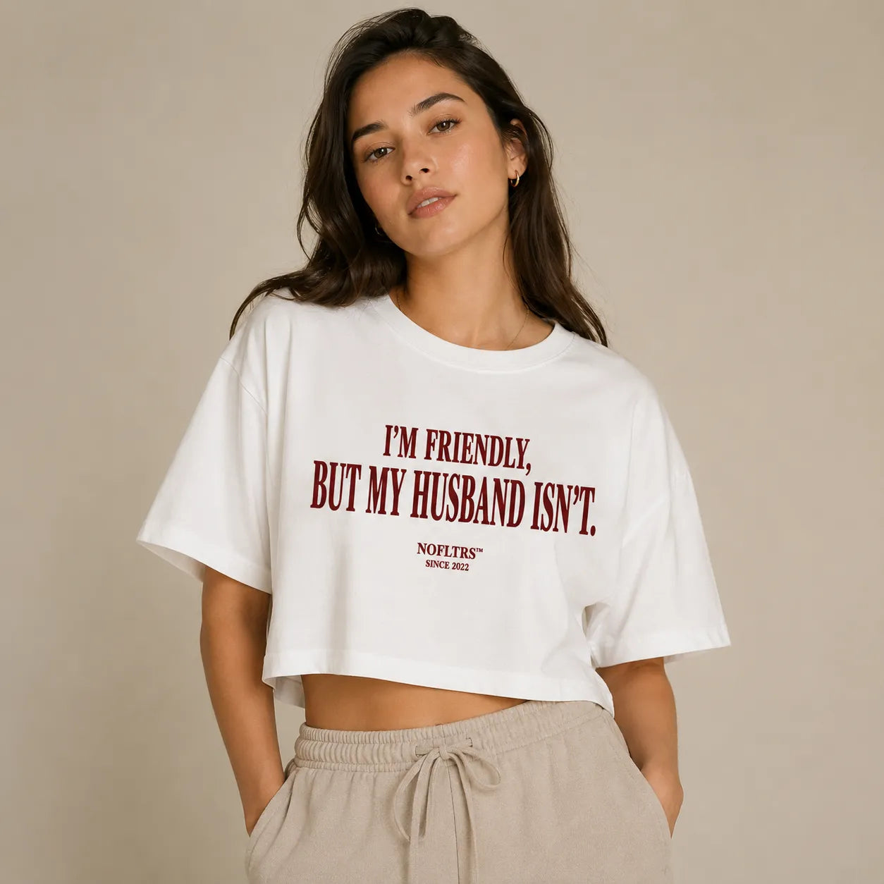 I'M FRIENDLY, BUT MY HUSBAND ISN'T CROP TEE