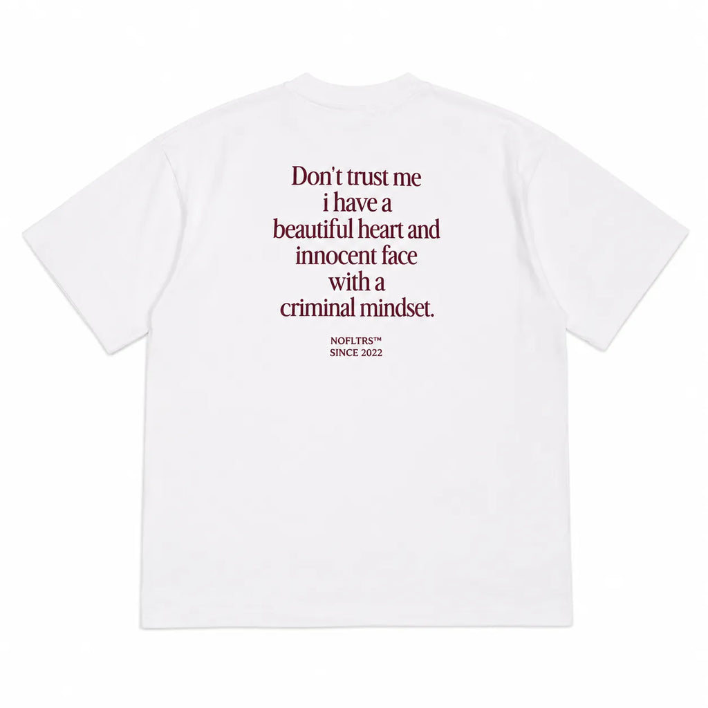 DON'T TRUST ME I HAVE A BEAUTIFUL HEART AND INNOCENT FACE WITH A CRIMINAL MINDSET