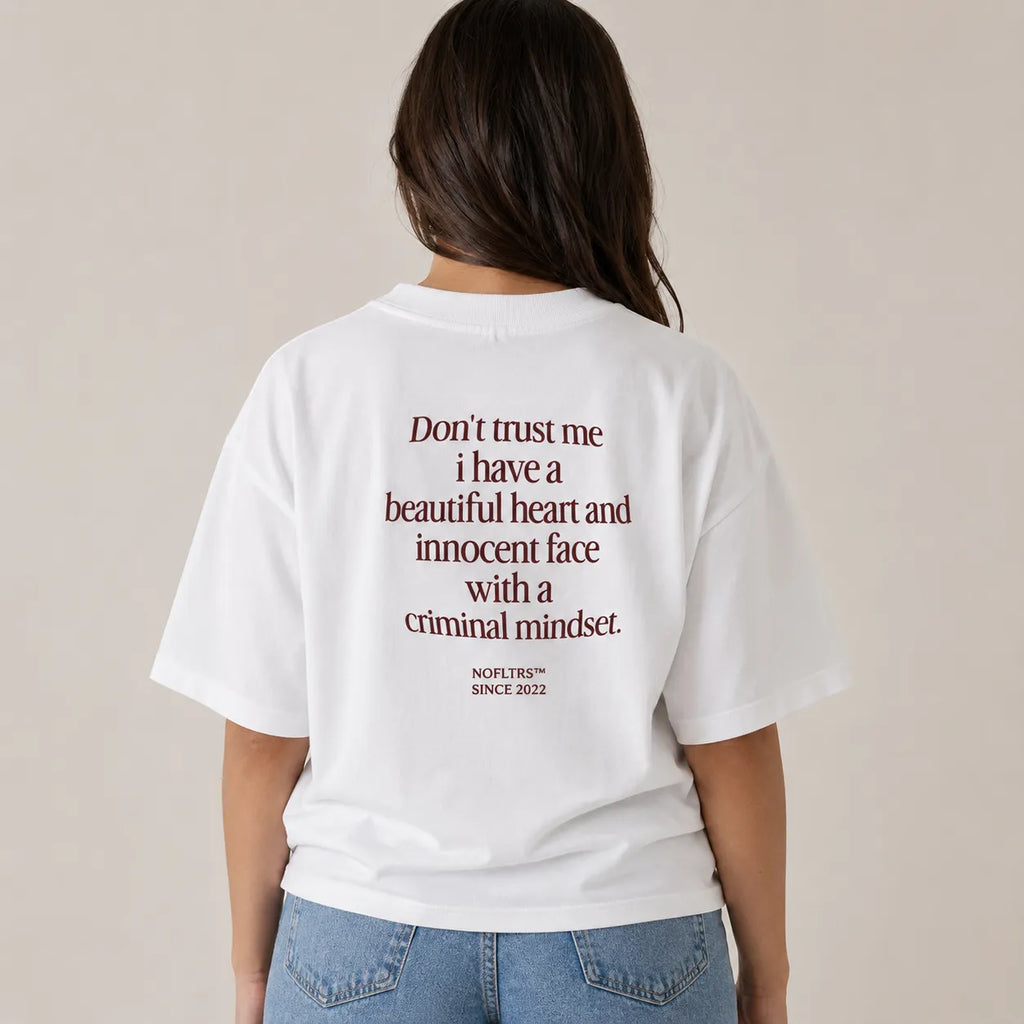 DON'T TRUST ME I HAVE A BEAUTIFUL HEART AND INNOCENT FACE WITH A CRIMINAL MINDSET